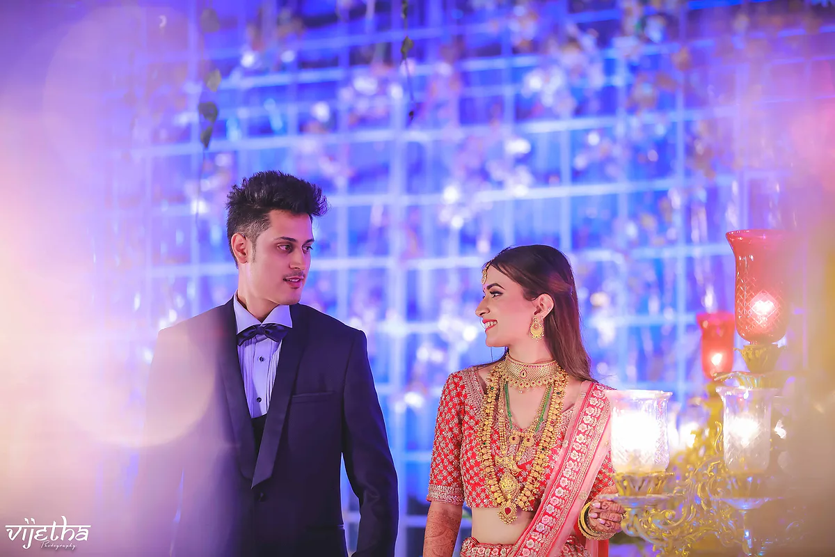 Radiant Red Lehenga Reception Bride - Dejavu Makeup Studio Bangalore bride in red lehenga with bridal makeup and luminous highlight.