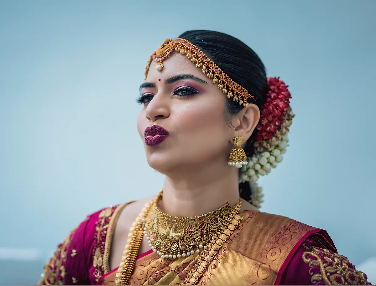 Regal Temple Jewelry Muhurtham Bride - Dejavu Makeup Studio Bangalore bride with bridal makeup, berry lip, and temple jewelry.